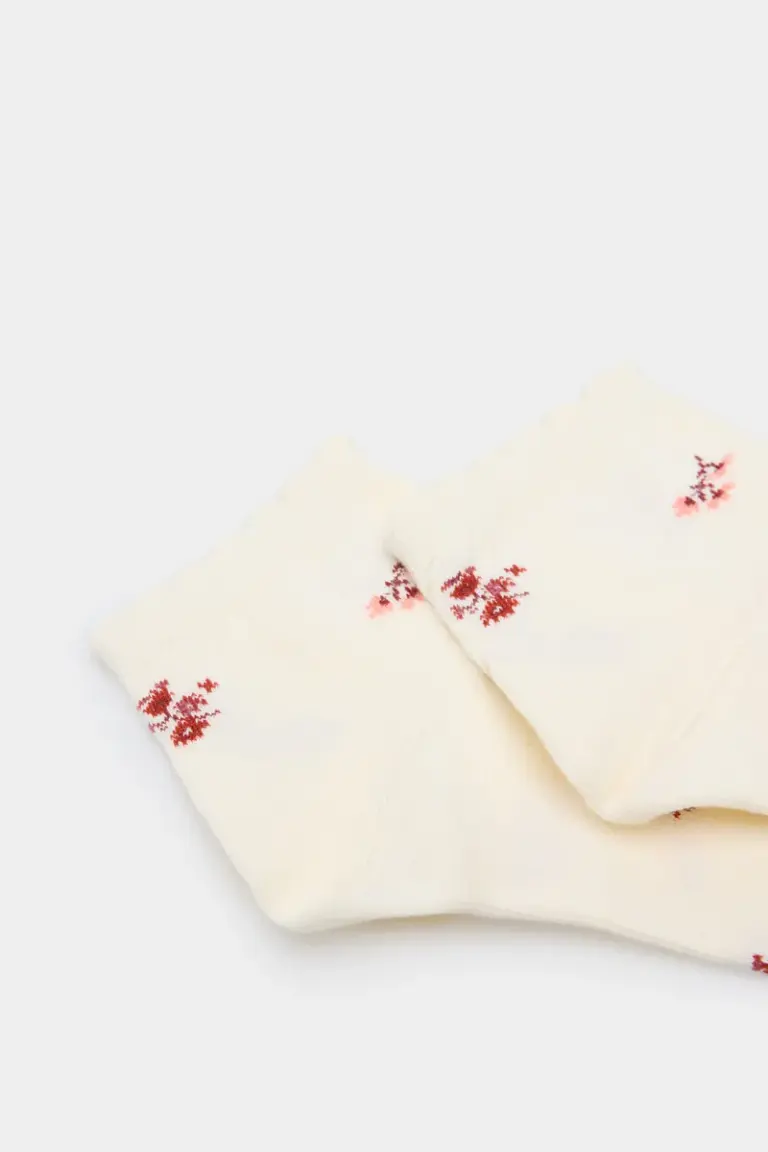 Short sock with floral motif